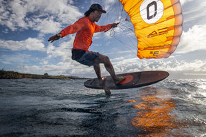 Rider foiling on a Code Foils R2 front wing